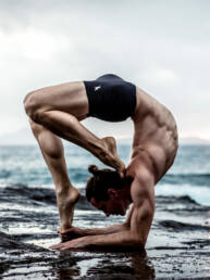 Jared McCann pose yoga ocean